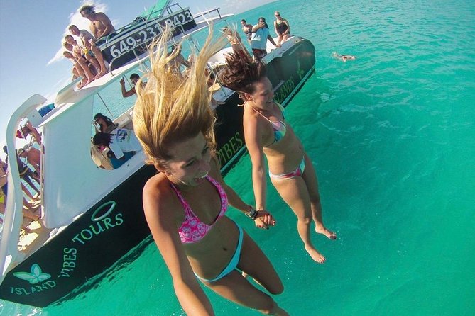 4hour Group Half Day Snorkeling Excursion in Grace Bay - Food, drinks, and the onboard mood