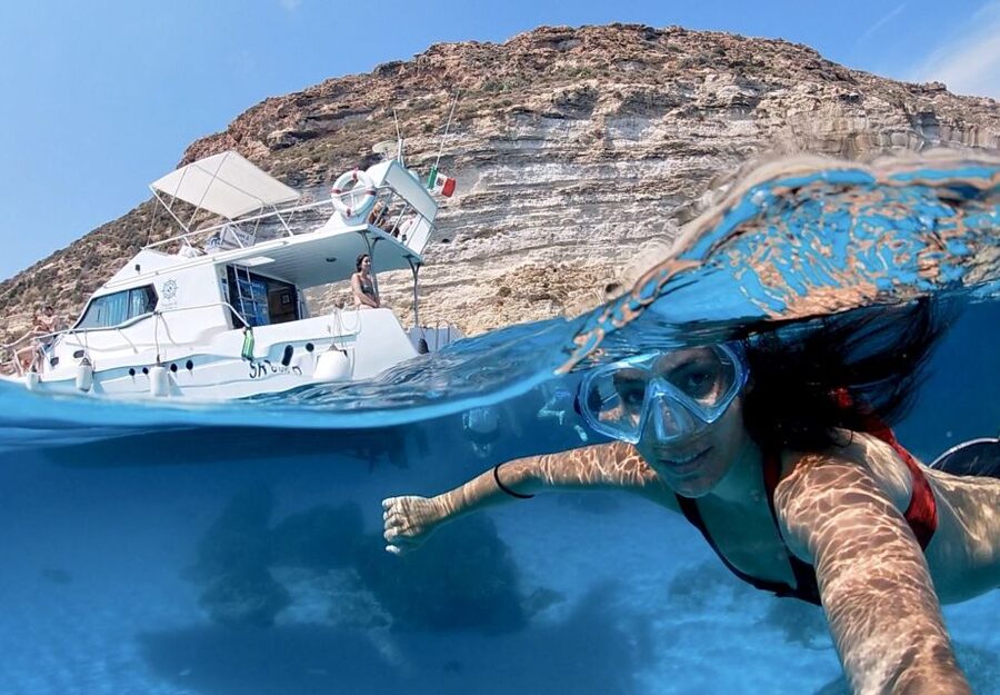 5 hours Lampedusa: Boat Tour with panino SUP e snorkeling - Isola dei Conigli and the Rabbit Island views