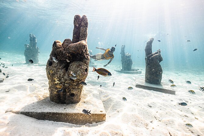 5-in-1 Cancun Snorkeling Tour with Sea Life & Transport Included - The shipwreck stop looks like a natural pool