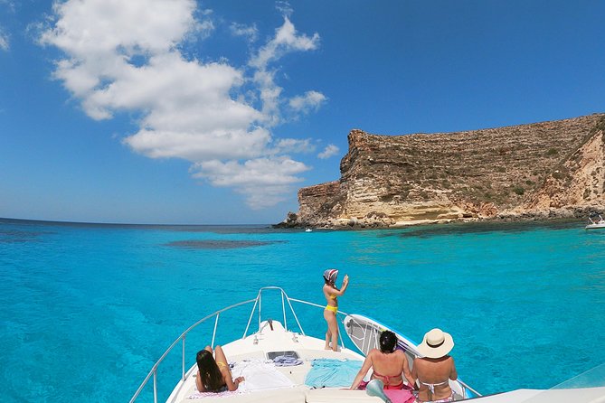 7 hours Boat trip to Lampedusa lunch, SUP and Snorkeling - La Tabaccara and the Clearest Water