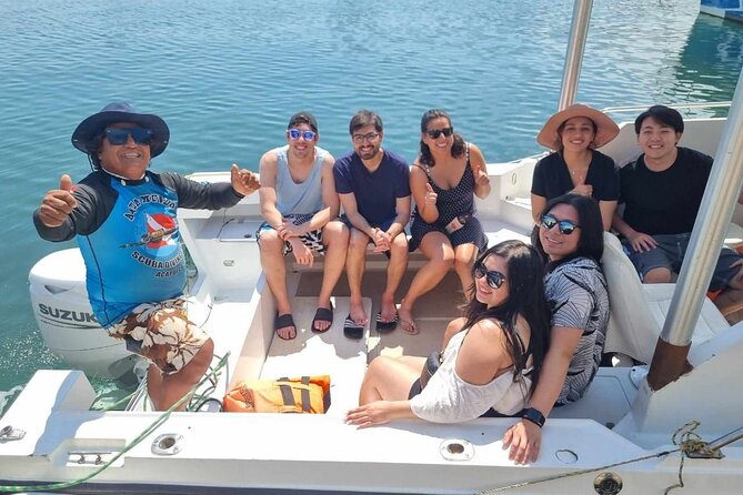 Acapulco Snorkeling Tour - Getting into the water and back aboard