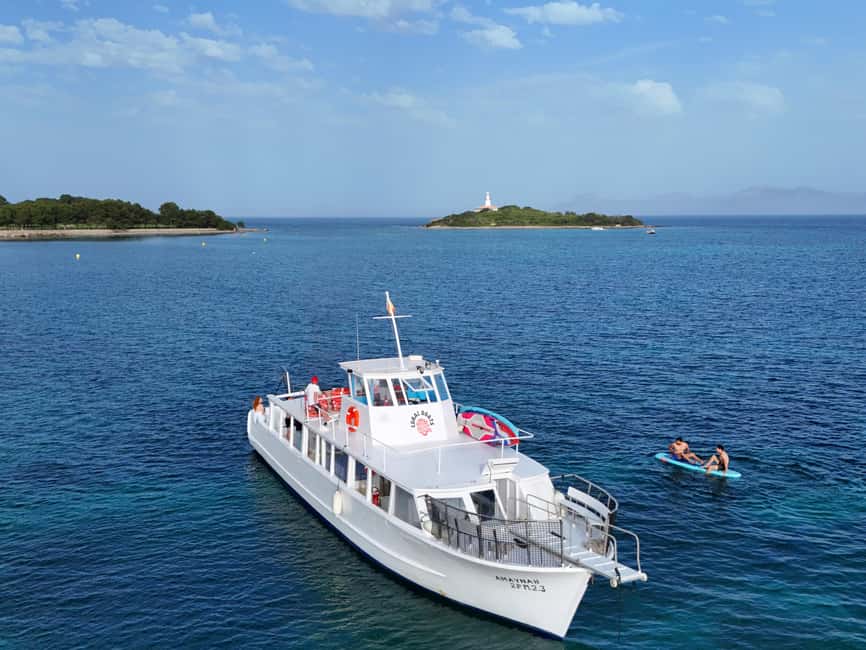 Alcudia Mallorca: Boat Trip with Food, Snorkeling, and SUP - The first cruise toward Platja del Coll Baix