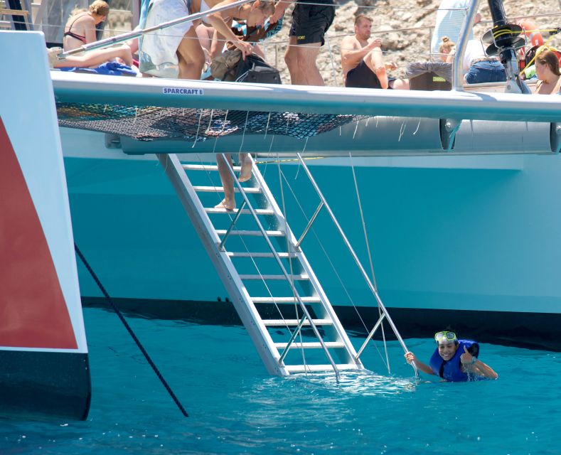 Alcudia: Sunset Catamaran Tour with Dinner and Snorkeling - Watching the Sun Drop Over Northern Mallorca