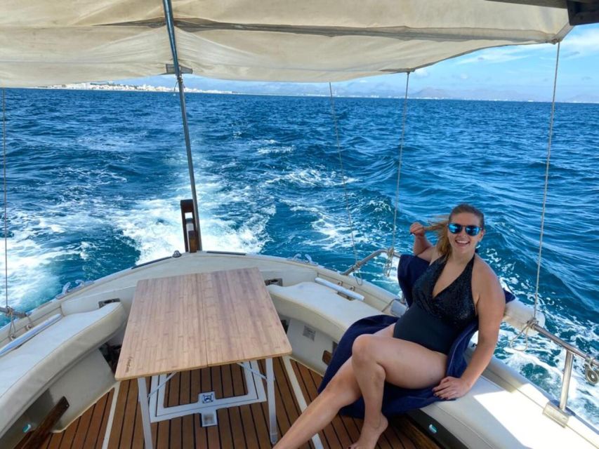 Alcudia: Traditional Wooden Boat Trip with Snorkeling - Aucanada Lighthouse and the second swim