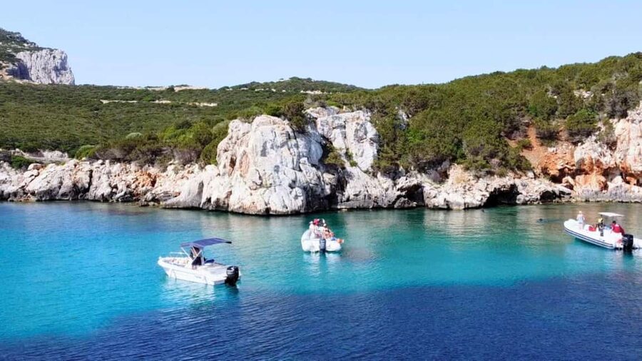Alghero: Snorkeling Boat Tour in Porto Conte and Capo Caccia - Cruising beneath Capo Caccia