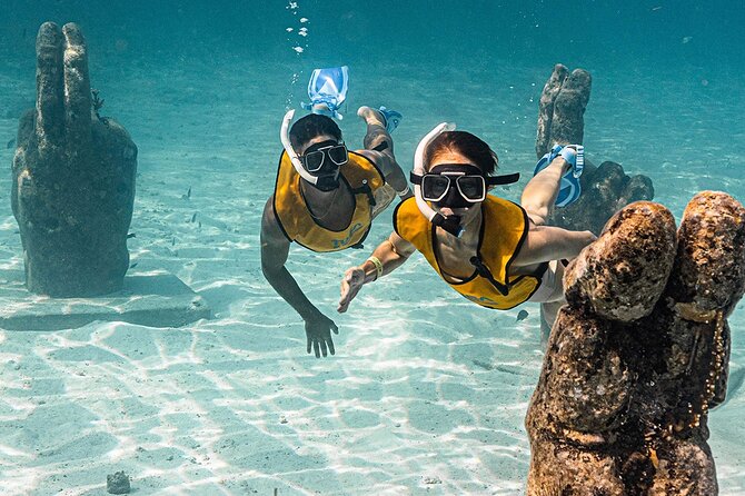 All-Inclusive Isla Mujeres Catamaran with Free Transportation - Lunch and beach club time on Isla Mujeres