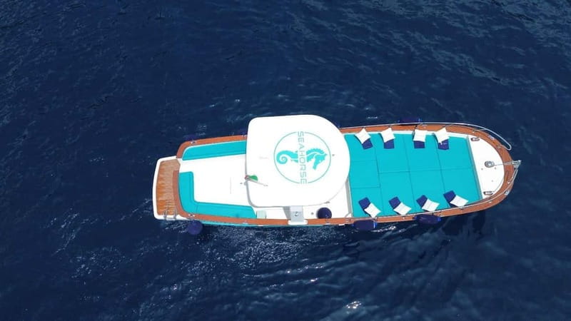 Amalfi: Boat Adventure Caves, Beaches, Snorkeling & Positano - Praiano brings another swim stop