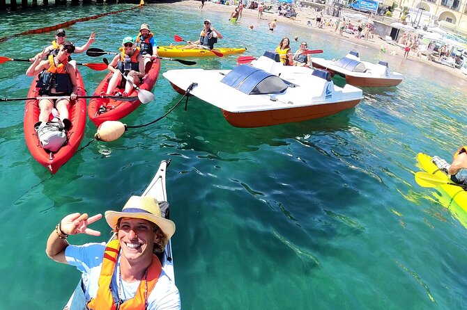 Amalfi Coast Kayak & Snorkeling Tour to the Pandora's Cave - Paddling past Maiori’s Norman Tower