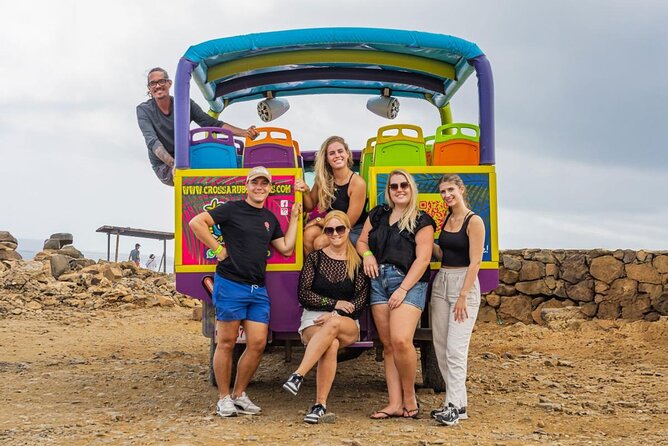 Aruba National Park Tour with Natural Pool & Baby Beach Snorkel - San Nicolas murals on the ride back
