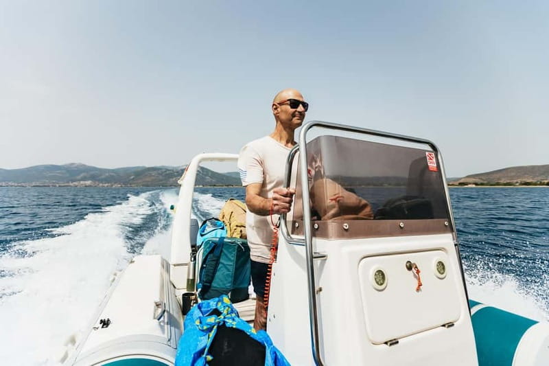 Athens, Nea Makri: Guided Small Group Snorkeling Boat Trip - A short snack break on the boat
