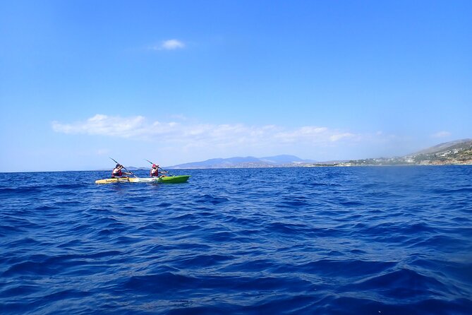 Athens Riviera: Sea Kayak and Snorkeling Adventure with Picnic - Following the coast toward rock formations and islets