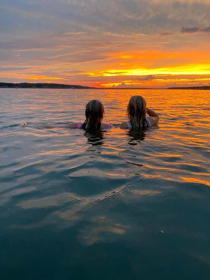 Bali: Lovina Sunset Tour with Snorkeling Experience - Boarding the boat at Lovina