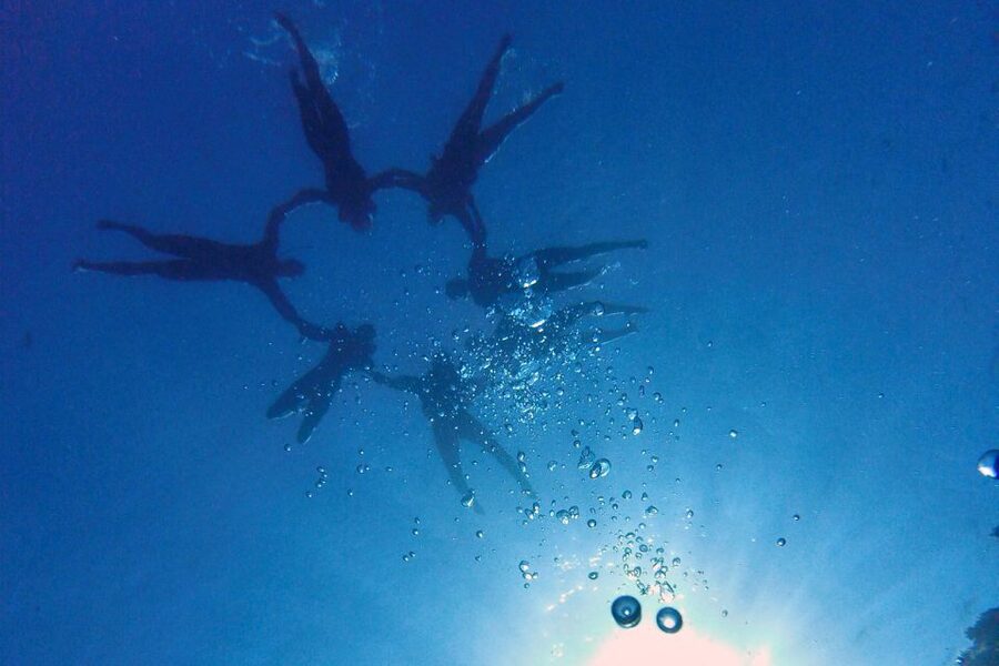 Barcelona: Costa Brava Kayak, Snorkel & Cliff Jump & Lunch - Kayaking through caves and rocky passages