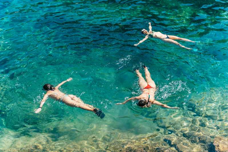 Barcelona: Tossa de Mar Kayak & Snorkel Tour w/3-Course Meal - Three hours among Costa Brava caves and coves