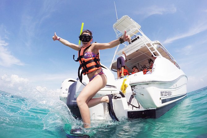 Beach Escape: Isla Contoy and Isla Mujeres with Snorkeling. - Isla Mujeres is the quick, busy contrast