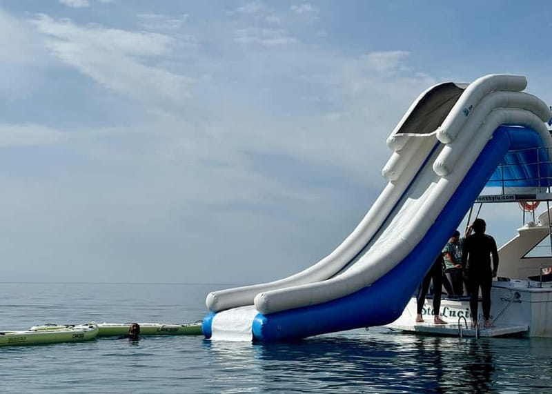 Benalmádena Boat Tour with Snorkeling, Water Slide and Lunch - The day depends on the sea