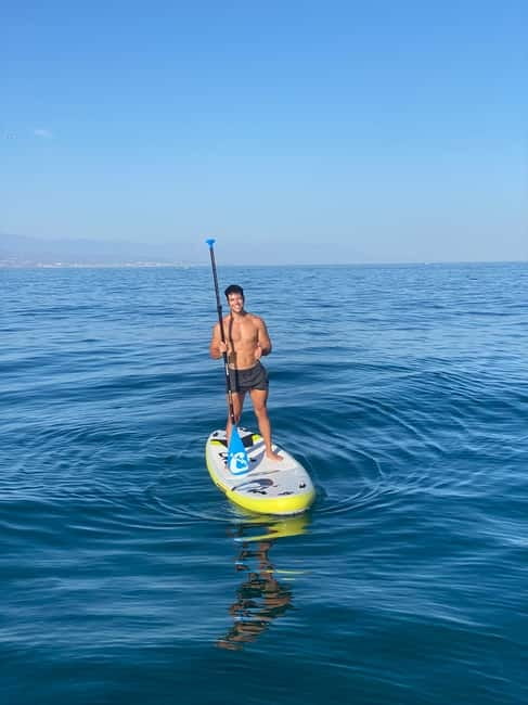 Benalmádena Boat Tour with Snorkeling, Water Slide and Lunch - The 20-foot slide and open-water swimming