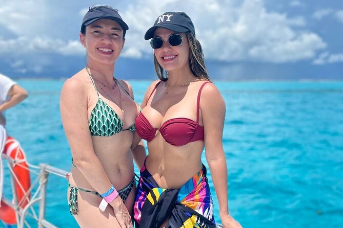 Best Catamaran Isla Mujeres tour with Open bar, lunch, snorkel - Morning check-in at Marina Albatros