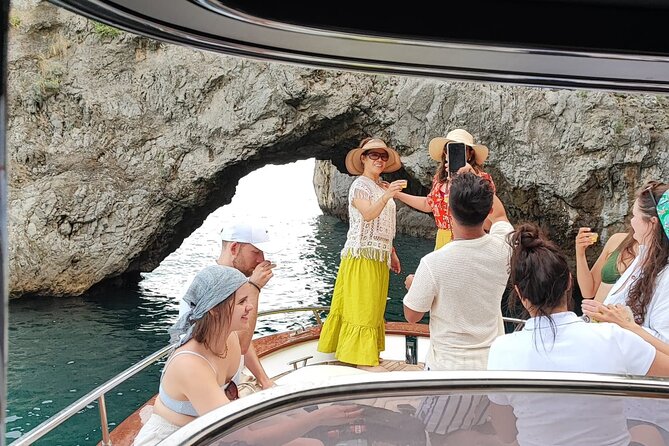 Blue Grotto and Capri Boat Tour with Aperitivo Swim and Snorkel - Mermaid Rock and the cliff of Villa Jovis