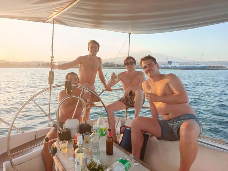 Boat trip to the Cyclades with Prosecco and snorkeling - Aci Castello from the water