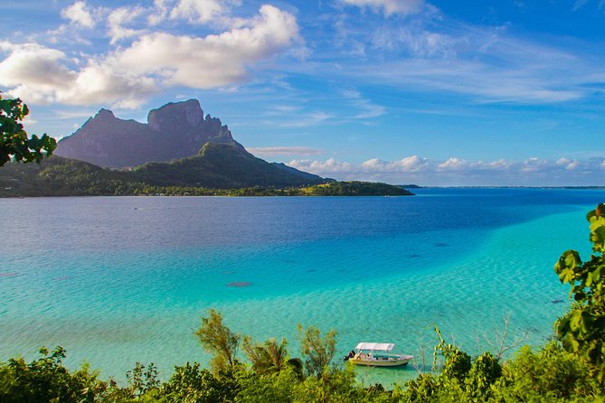 Bora Bora Combo Tour: Lagoon Cruise and 4WD Tour Including Snorkeling - Three lagoon stops with rays, sharks, and coral