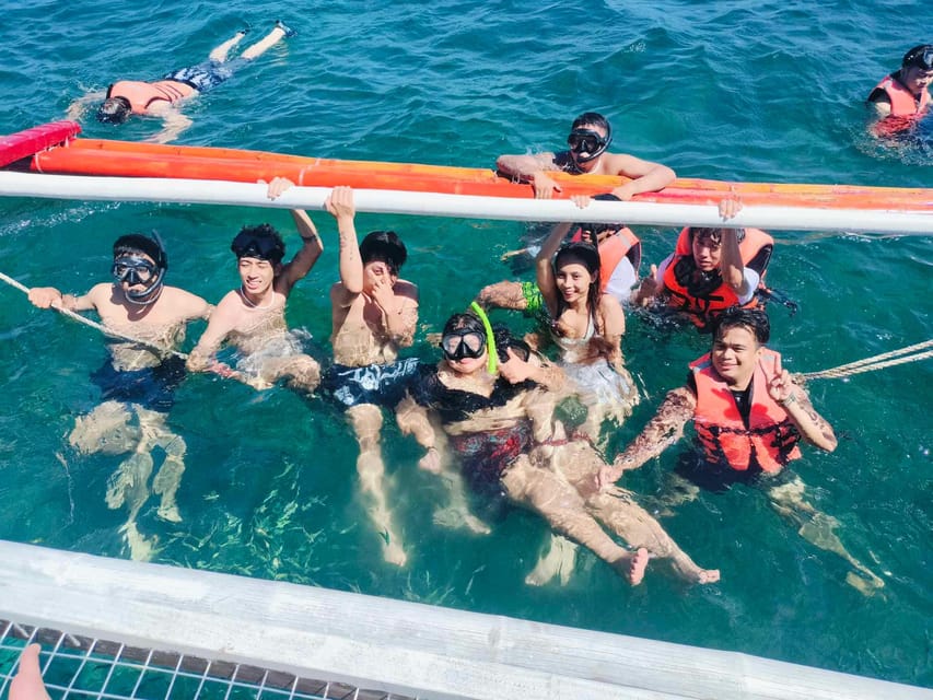 Boracay: Island Hopping with Snorkeling and Crystal Cove - Puka Beach and nearby island scenery