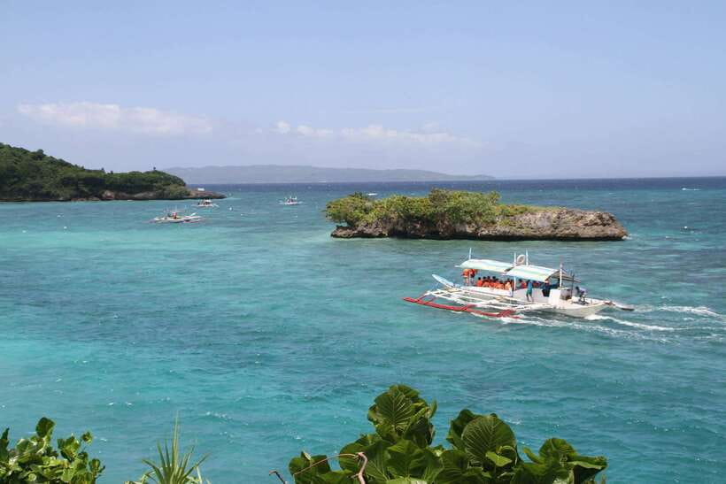 Boracay: Private Island Hopping & Snorkeling Tour - Puka Beach, where the morning starts with sand and views