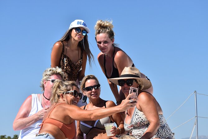 Cabo San Lucas Boat Tour with Snorkeling, Open Bar, and Lunch - Cruising the Sea of Cortez toward the swim stop