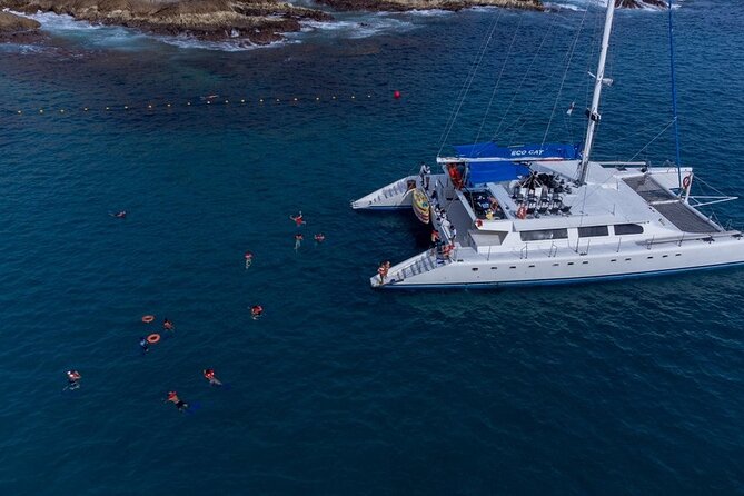 Cabo San Lucas Catamaran Cruise: Snorkel or Sunset Adventure - Music, seating, and the onboard mood