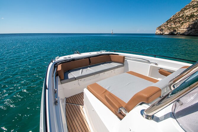Cagliari 3 Hours Luxury Motorboat Tour - Wine and Snorkeling - Local wine and the simple pleasures on board