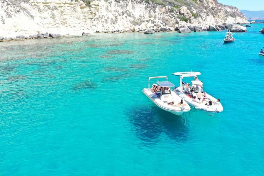 Cagliari: Boat Tour, 4 Stops, Swim, Snorkeling, & 1 Spritz - Cala Bernat: the first look at clear water