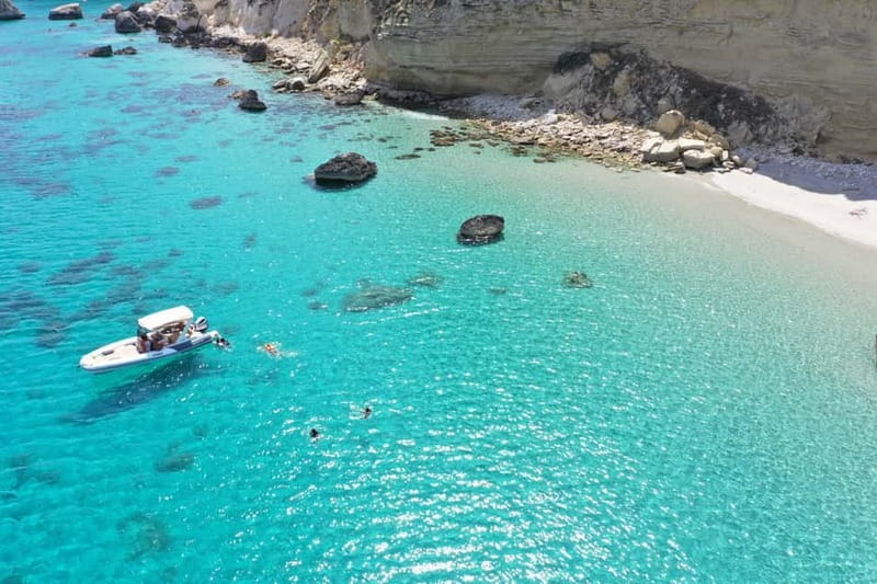 Cagliari: Boat Tour, 4 Stops, Swim, Snorkeling, & 1 Spritz - Music, stories, and a drink onboard