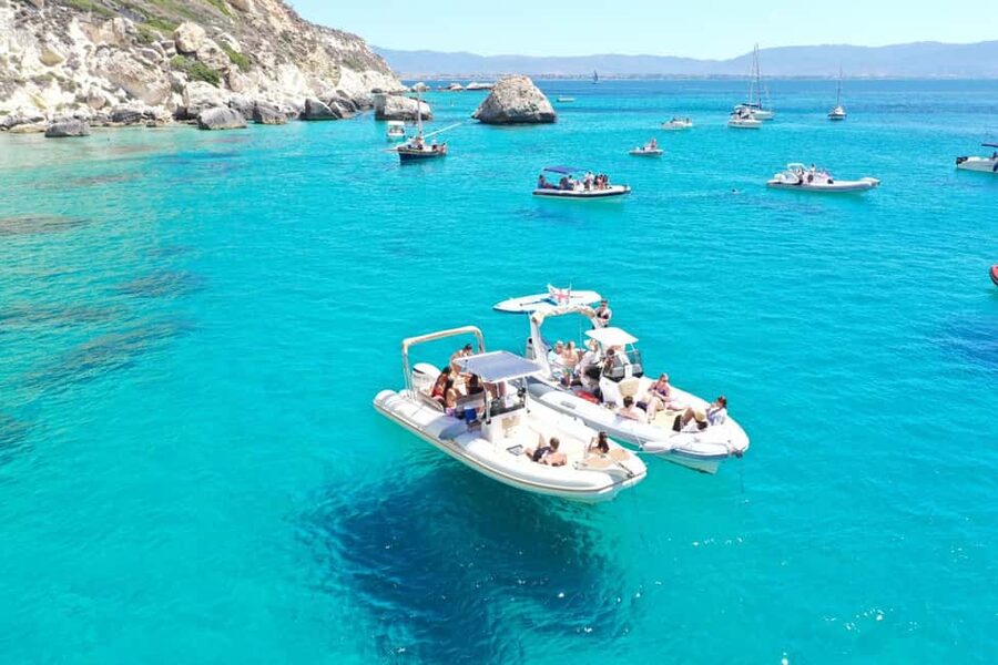 Cagliari: Boat Tour, 4 Stops, Swim, Snorkeling, & 1 Spritz - Poetto Beach closes the coastal loop