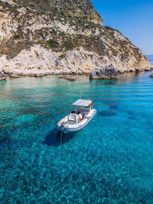 Cagliari: Boat Tour, Snorkeling, Prosecco & Music! - A quick RIB ride from Marina Piccola
