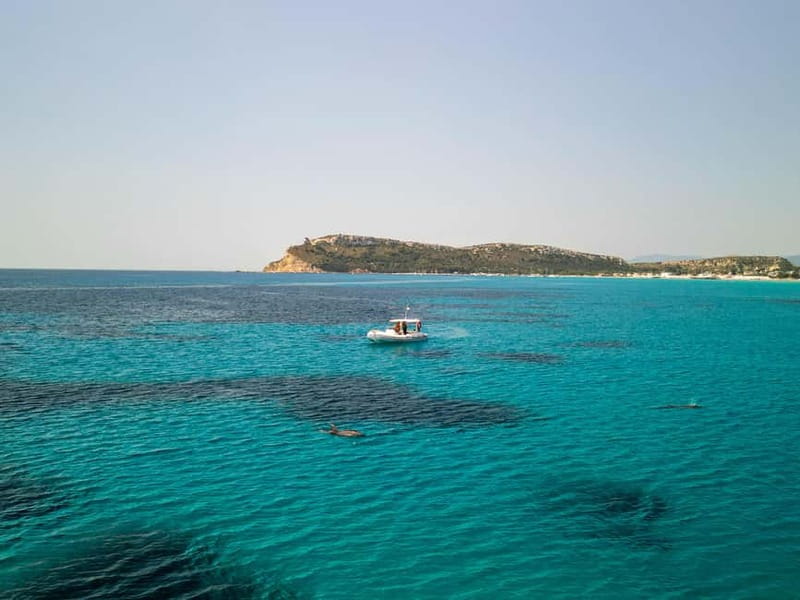 Cagliari: Boat Tour, Snorkeling, Prosecco & Music! - Cala Bernat and the first look at the Gulf