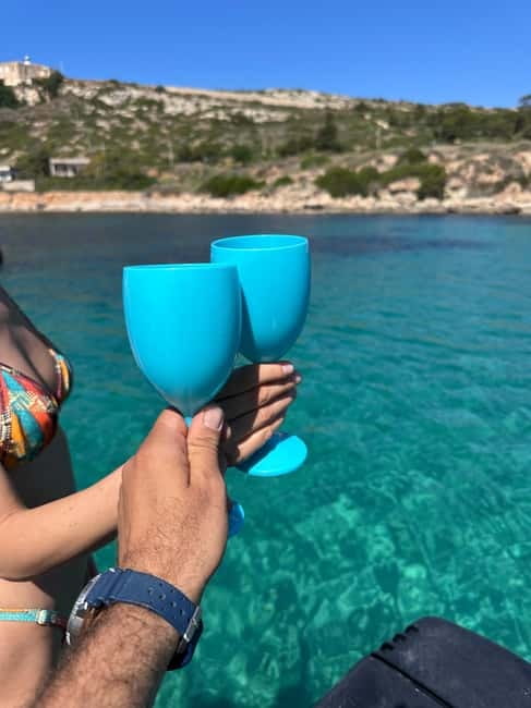 Cagliari: Boat Tour, Snorkeling, Prosecco & Music! - What the price includes at $39.86