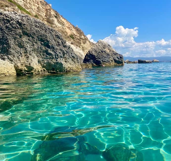 Cagliari: Boat Tour with Snorkeling, GoPro & Sardinian Beer - Cala Mosca: a first swim in clear water