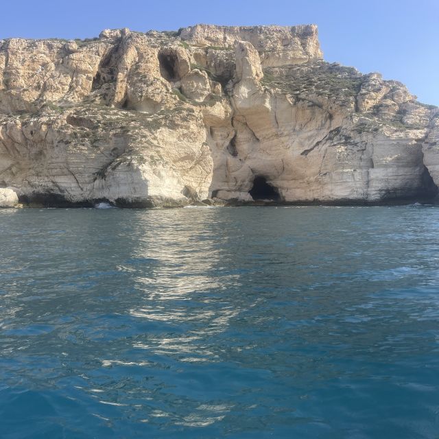 Cagliari: Boat Tour with Swim Stops, Snorkeling, & Aperitif - Sella del Diavolo puts the landmark in context