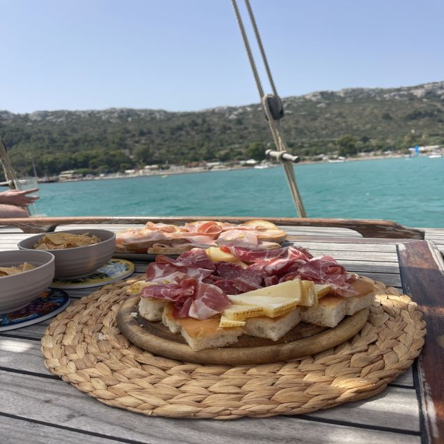 Cagliari: Boat Tour with Swim Stops, Snorkeling, & Aperitif - Marina Piccola gives you an early start in the water