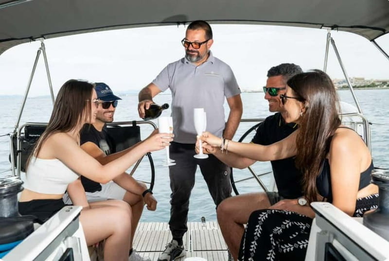 Cagliari: Catamaran Tour, Swimming, Snorkeling, & Prosecco - Setting sail from Portus Karalis