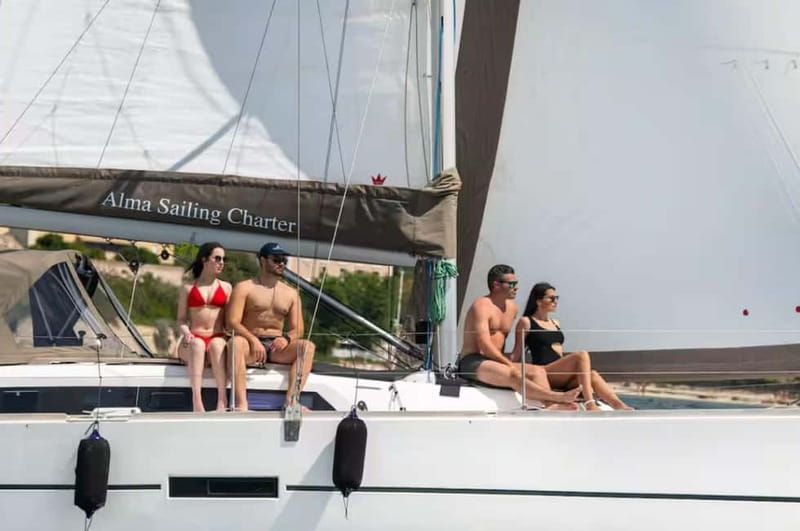 Cagliari: Catamaran Tour, Swimming, Snorkeling, & Prosecco - Cala Mosca: your first chance to swim