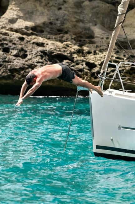 Cagliari: Catamaran Tour, Swimming, Snorkeling, & Prosecco - The crew and the feel on board