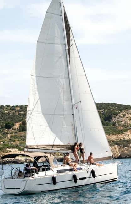 Cagliari: Catamaran Tour, Swimming, Snorkeling, & Prosecco - The first views near Cala Bernat