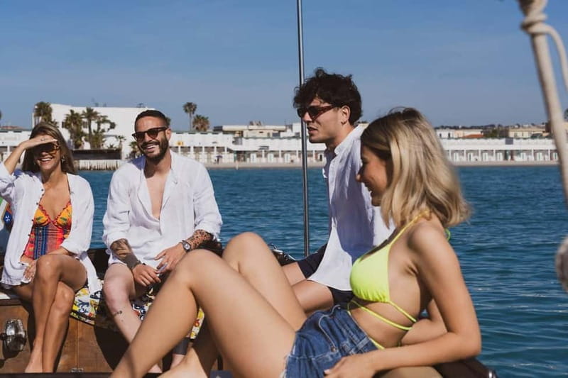 Cagliari: Gozzo Tour with 3 Swim Stops, Snorkel & Local Food - Cala Fighera keeps the swimming rhythm going