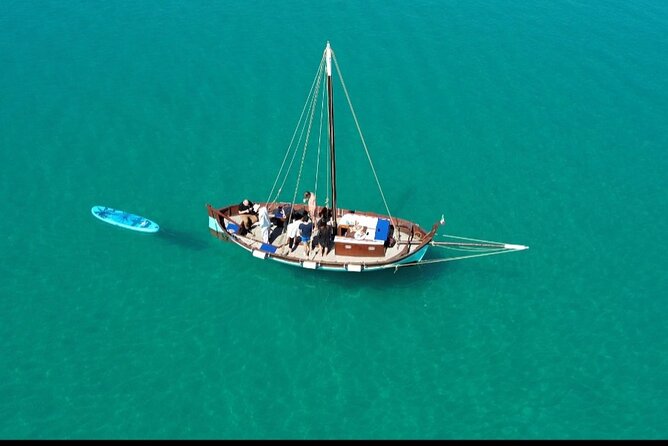 Cagliari Gulf Boat tour : 5 stops, snorkeling & local aperitif - Cala Fighera, Fish, Rocks, and a Sea Cave