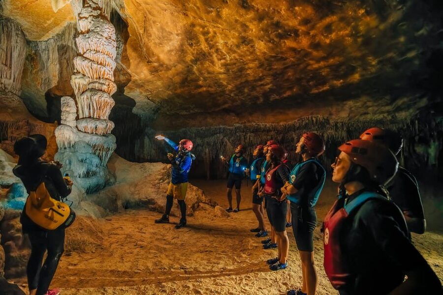 Cala Varques: Guided Sea Caves Kayak & Snorkeling Expedition - Paddling toward the caves and cliffs
