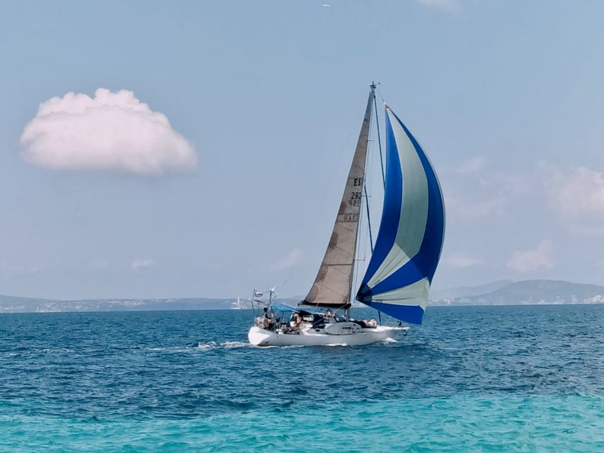 Can Pastilla: Sailboat Tour with Snorkeling, Tapas & Drinks - Sailing between stops, with time to enjoy the boat