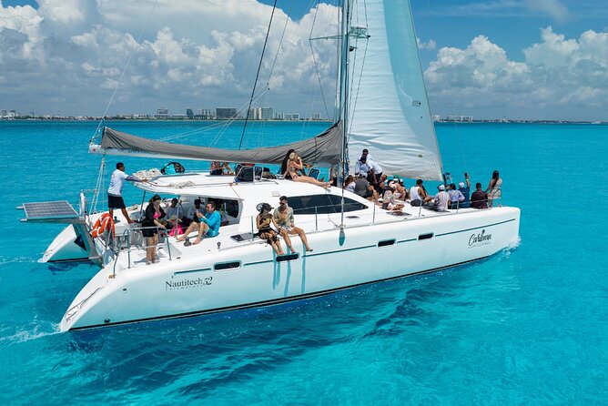 Cancun Catamaran: Isla Mujeres, Snorkeling, Drinks & Buffet Lunch - Sailing across the Caribbean to Isla Mujeres