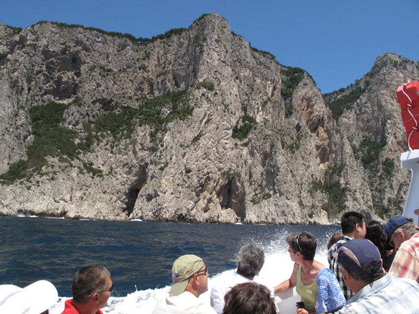 Capri: Private Island Boat Tour with Snorkeling and Swimming - Leaving Marina Grande for the Coast