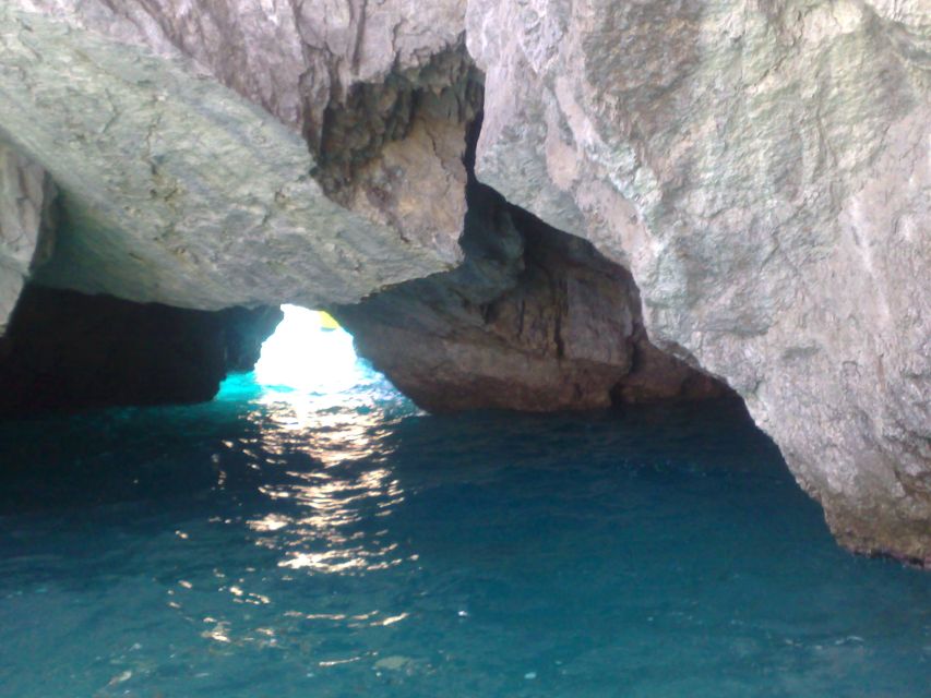 Capri: Private Island Boat Tour with Snorkeling and Swimming - The Green, White, and Red Grottos